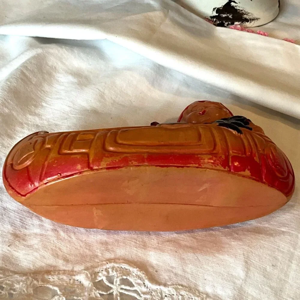 Rare 1920's Antique celluloid toy girl in a canoe; don't miss her!